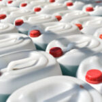 plastic canisters with windshield washer fluid